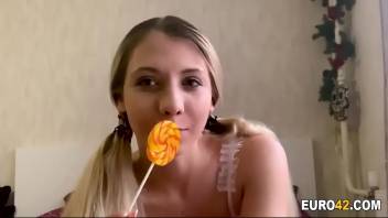 Blonde teen tastes her pussy after a candy